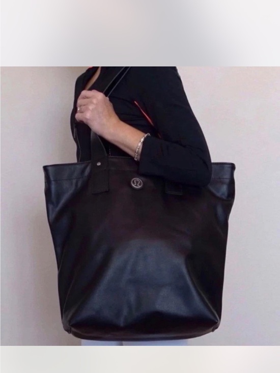lululemon athletica Handbags - lululemon athletica Black Leather Tote with Logo Medallion